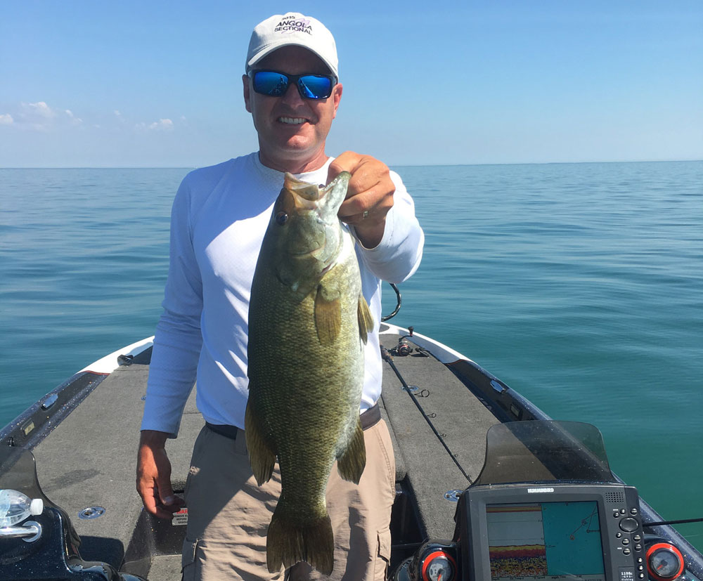Heath Wagner with smallmouth bass