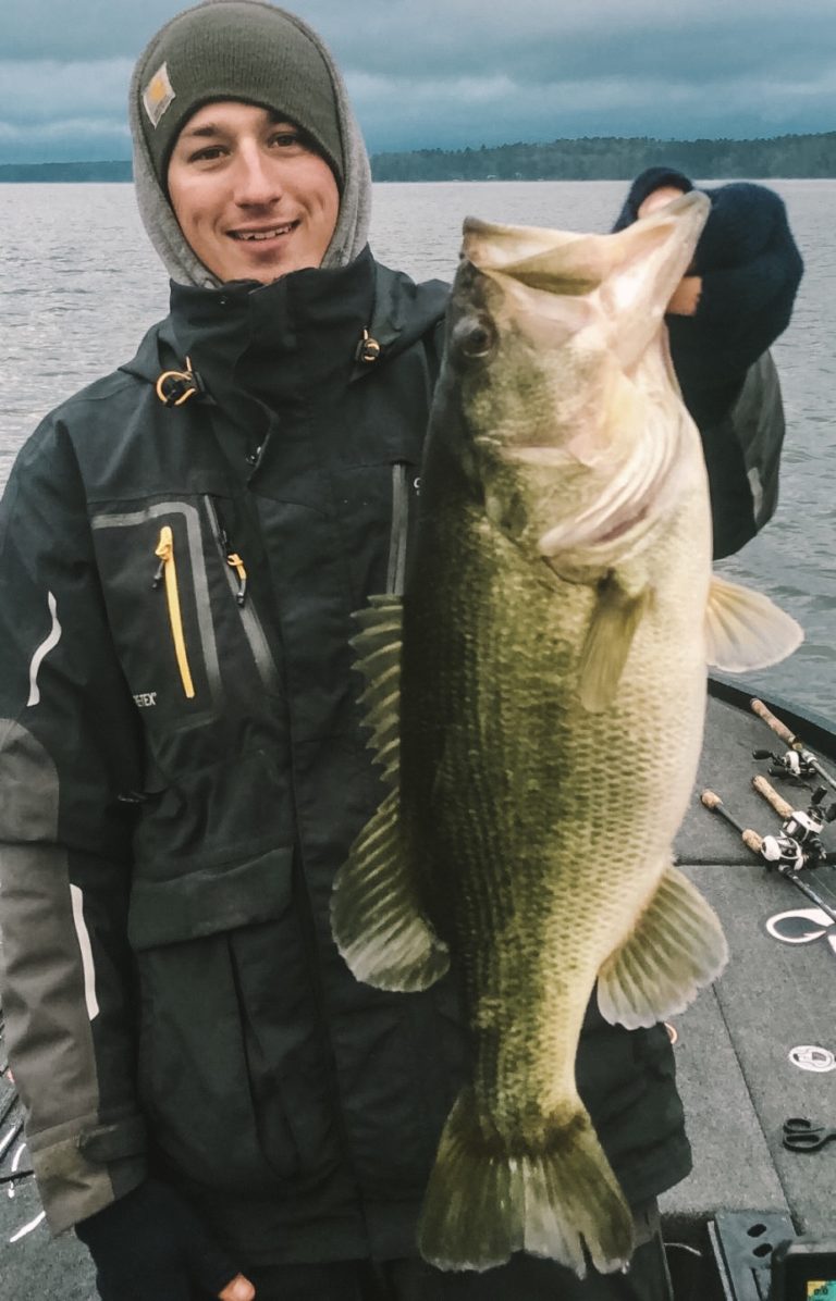 Grae Buck holding up a Largemouth Bass