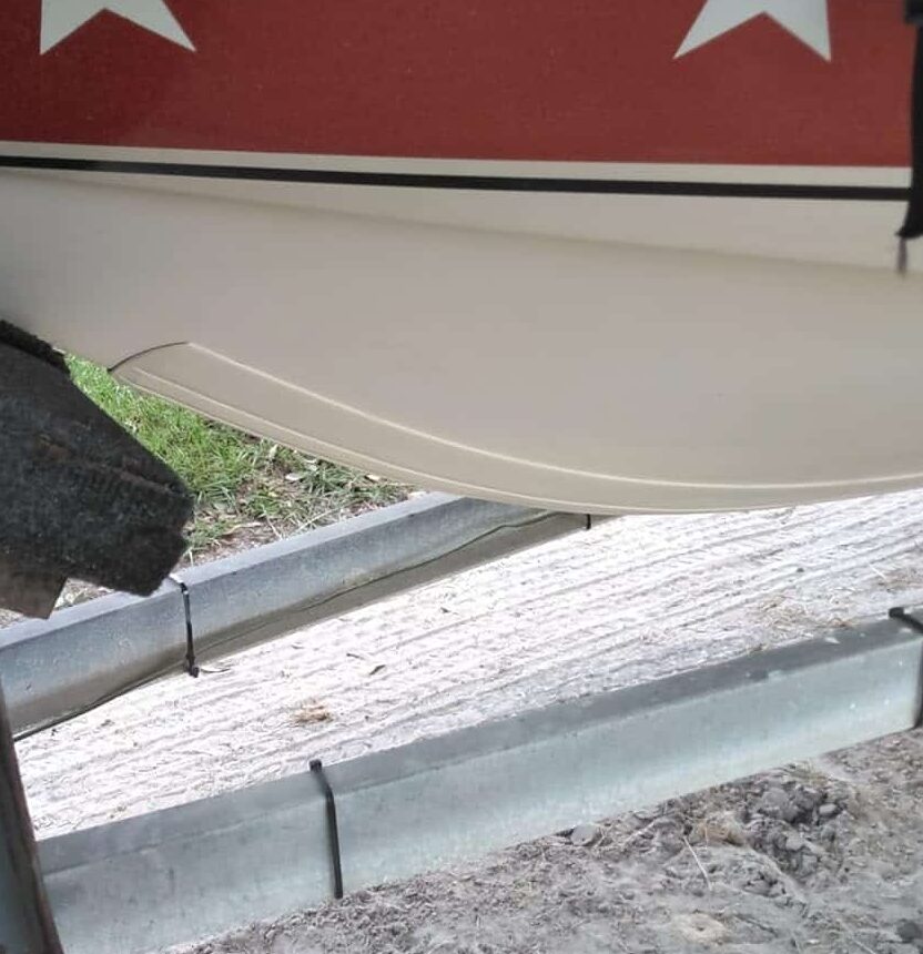 white megaware keelguard on a white and red boat hull testimonial review