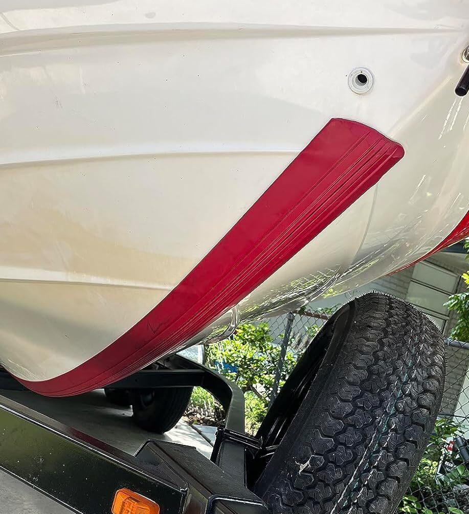 Red megaware keelguard on a white and red boat