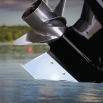 A stainless steel sleeve covering the skeg of a boat motor