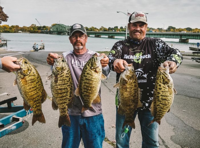 Farver and Cline holding 5 smallmouth bass from Day 2 of the Megaware R&B Circuit Classic