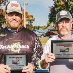 Farver and Cline holding plaques at the Megaware R&B Bass Circuit Classic.
