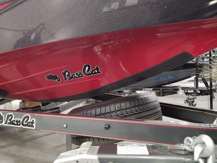 BassCat boat with a red hull and black Megaware KeelGuard